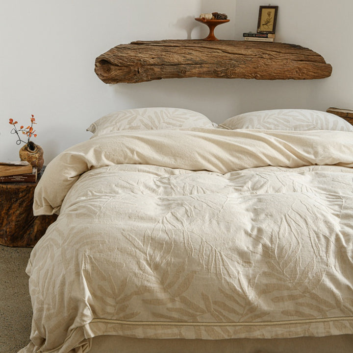 Vintage-inspired linen bedding set with subtle floral damask & ruffle