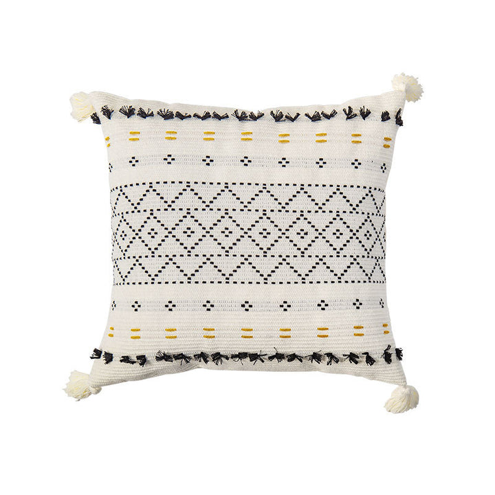 Square decorative cushion cover made of cotton blend with hand-tufted geometric relief and tassels