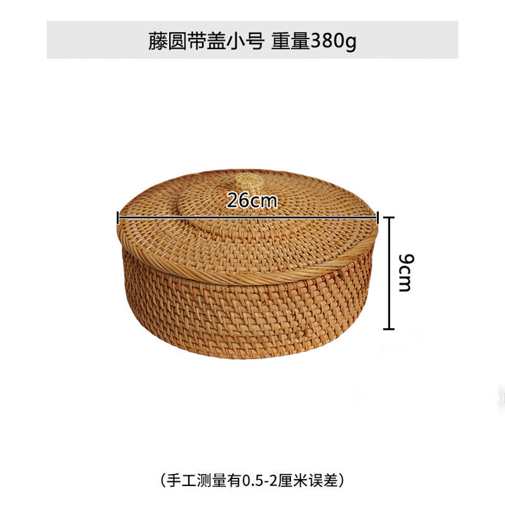 Women's round storage basket made of woven natural material Stornfield