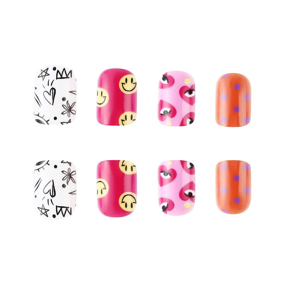 Artistic Press-On Nail Art Set with Playful Designs Stornfield