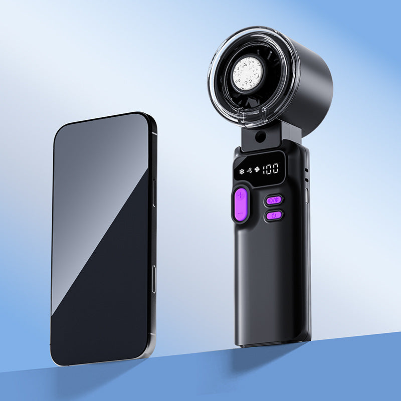 Cooling rechargeable handheld digital display misting mini fan with adjustable tilt and USB-C charging Stornfield