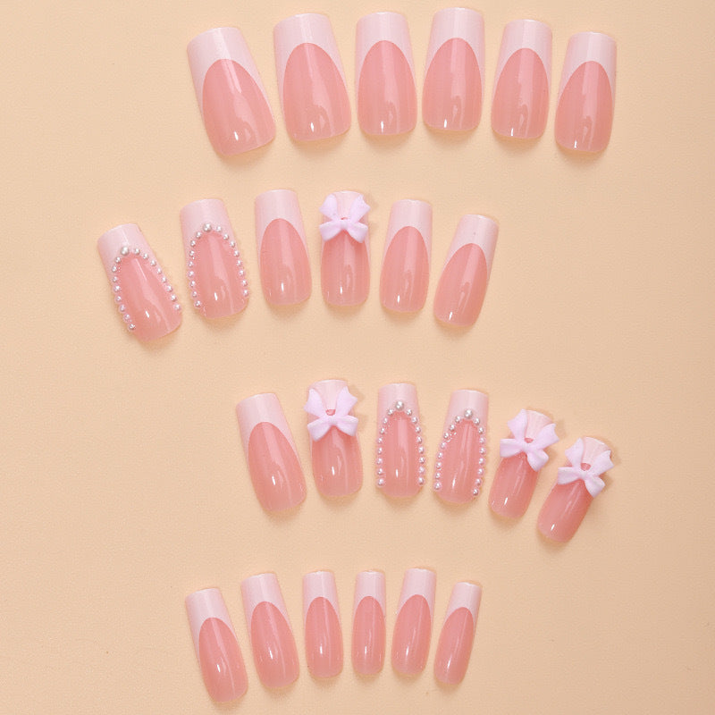 Artificial nails with delicate flower and pearl embellishments Stornfield