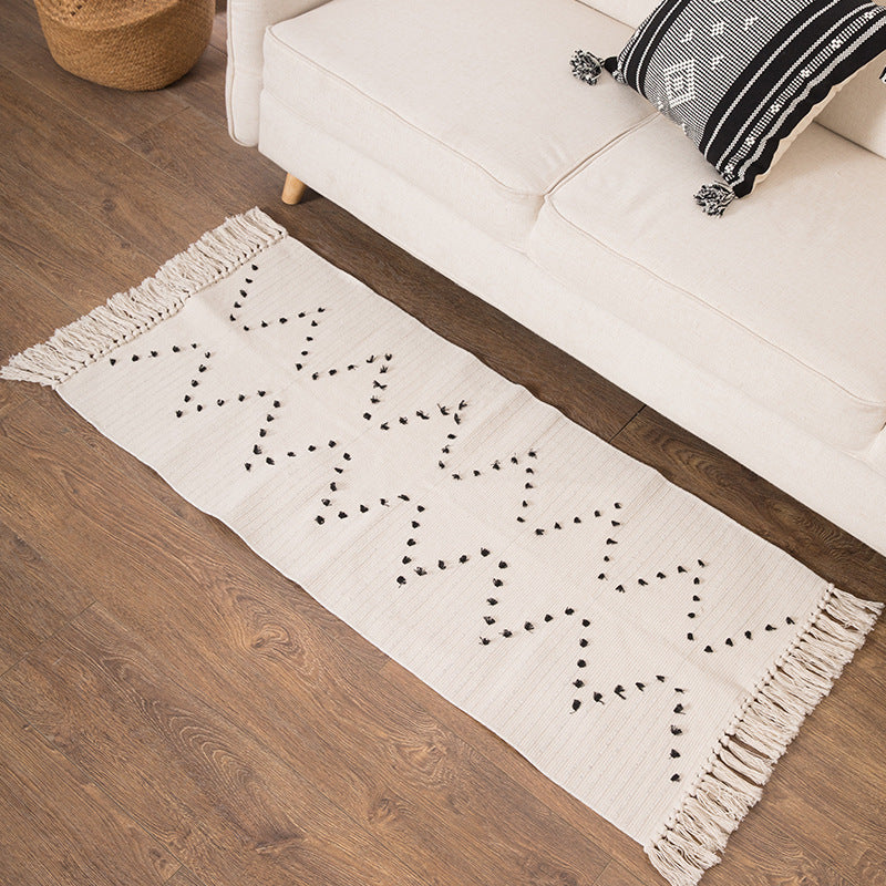 Woven runner rug with fringes and graphic polka dot pattern Stornfield