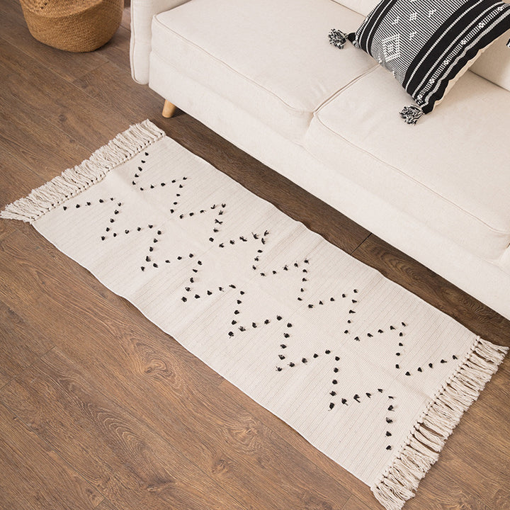 Woven runner rug with fringes and graphic polka dot pattern Stornfield