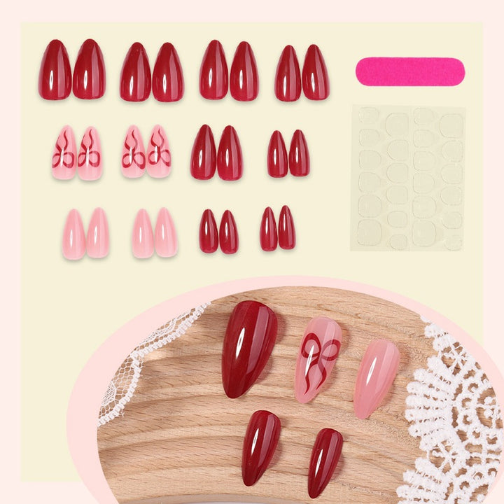 Artificial nail set with luxurious deep red and pale rose tones Stornfield