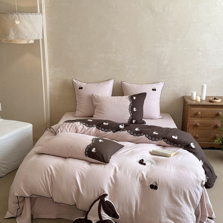 Bedding set made of cotton satin with embroidered cherry motif and decorative frill