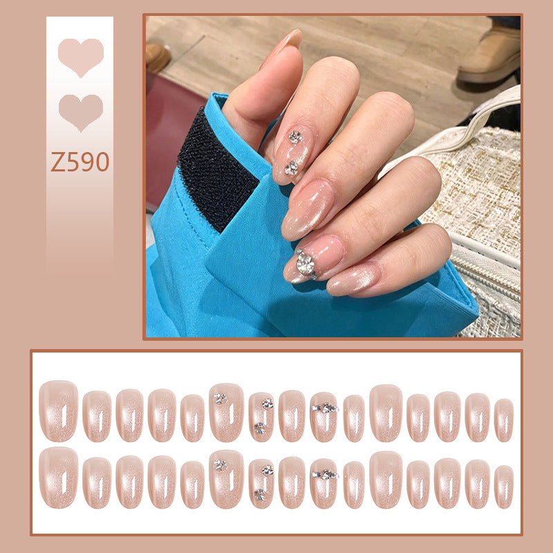 Artificial nail set with elegant rhinestone embellishments Stornfield