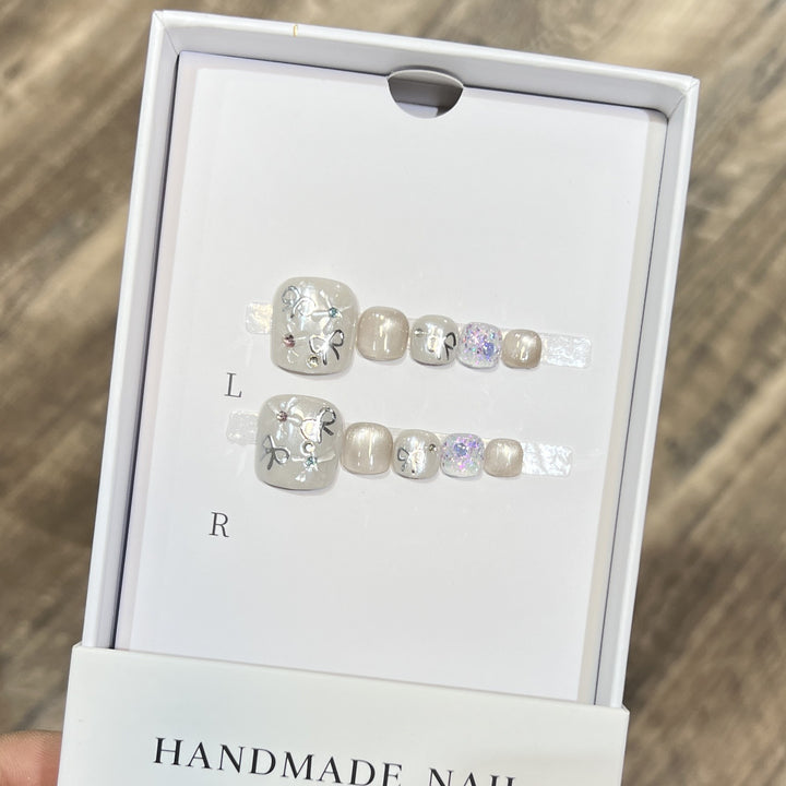 Artistic Press-On Nail Set with Glitter and Floral Design Stornfield