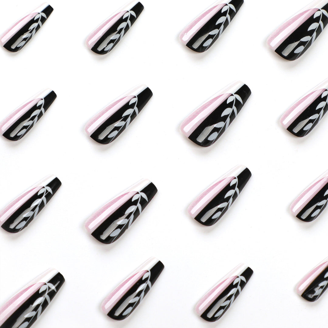 Artful nail extensions in elegant black and white design Stornfield