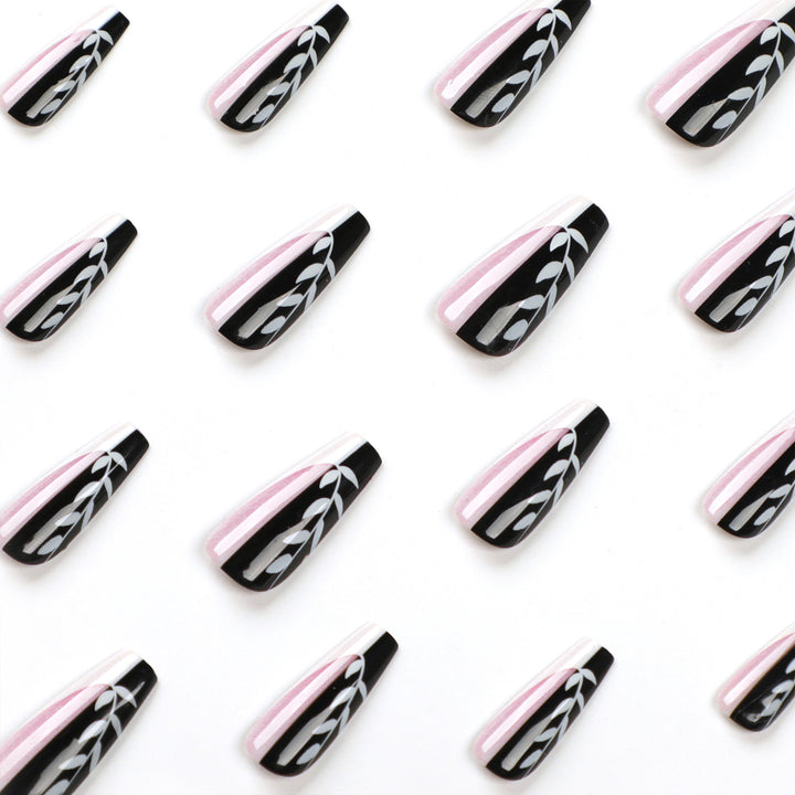 Artful nail extensions in elegant black and white design Stornfield