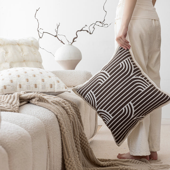 Decorative cushion with geometric pattern