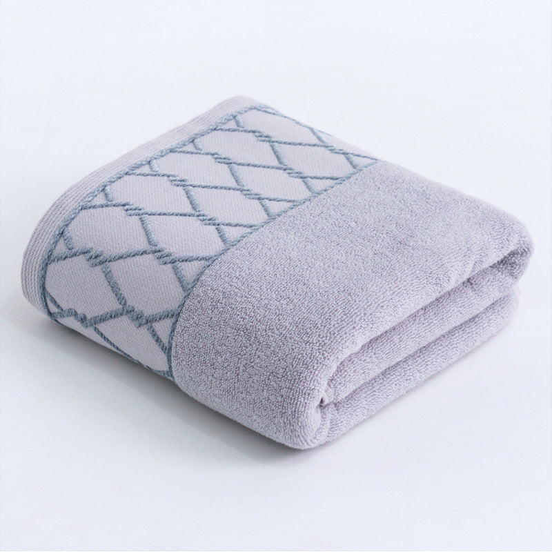 Large premium terry bath towel with decorative structure border