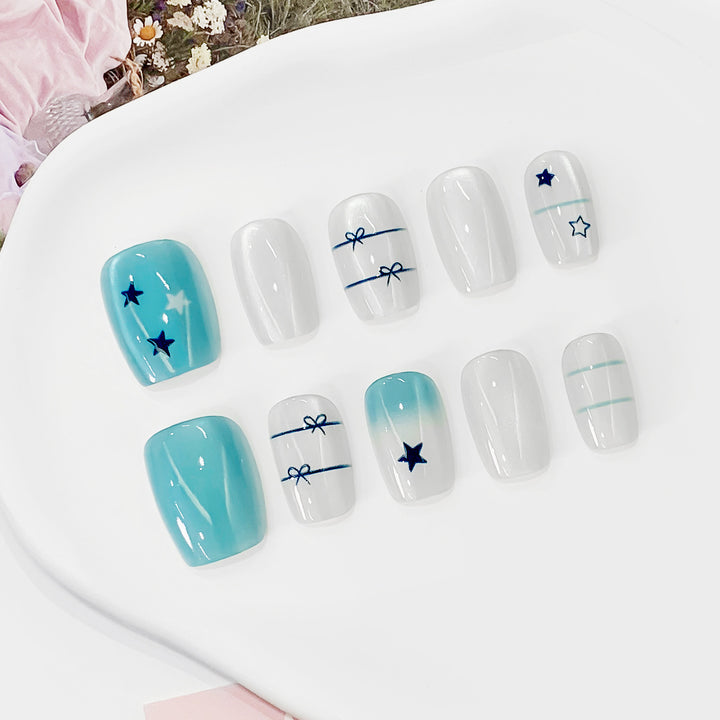 Artistic acrylic nails with star design Stornfield