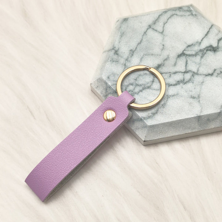Unisex keychain made of high-quality synthetic leather with elegant metal embellishment Kalsten