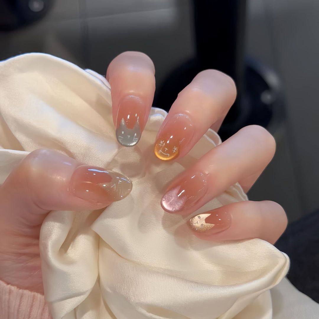 Artificial nail tips with playful cat design Stornfield