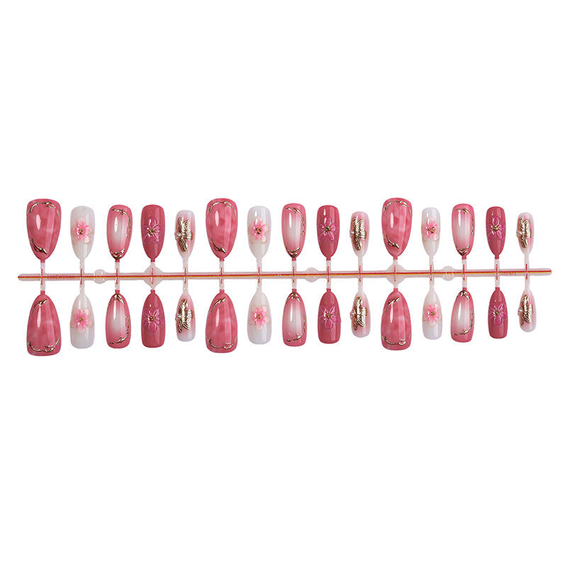 Artificial nail set with elegant flower and glitter details Stornfield