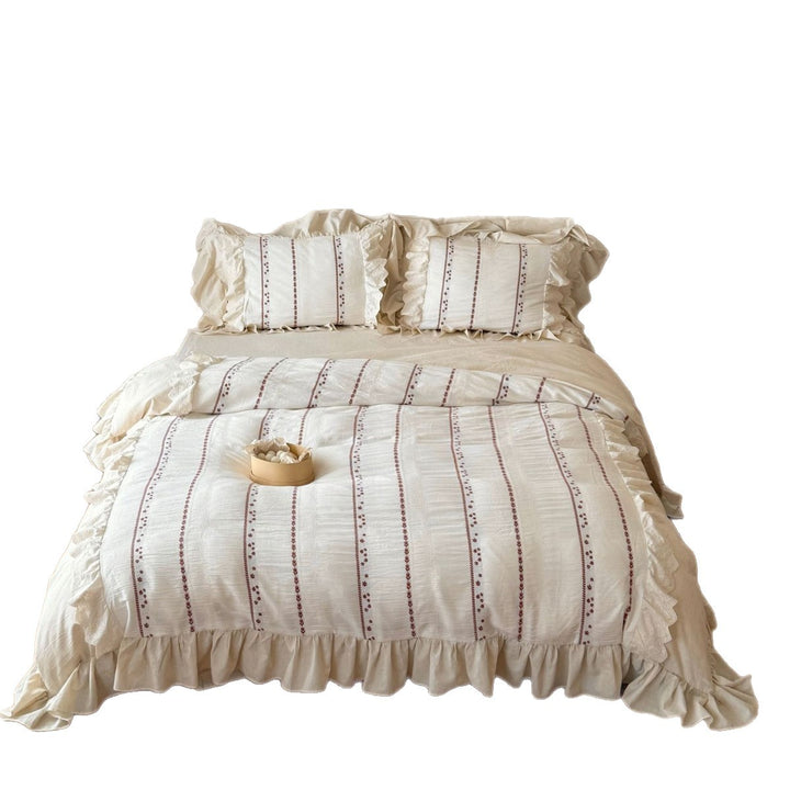 Ruffled cotton-linen bed linen set with embroidered longitudinal stripes