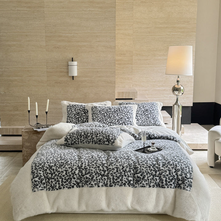 Plush bedding set with leopard faux fur and reversible function