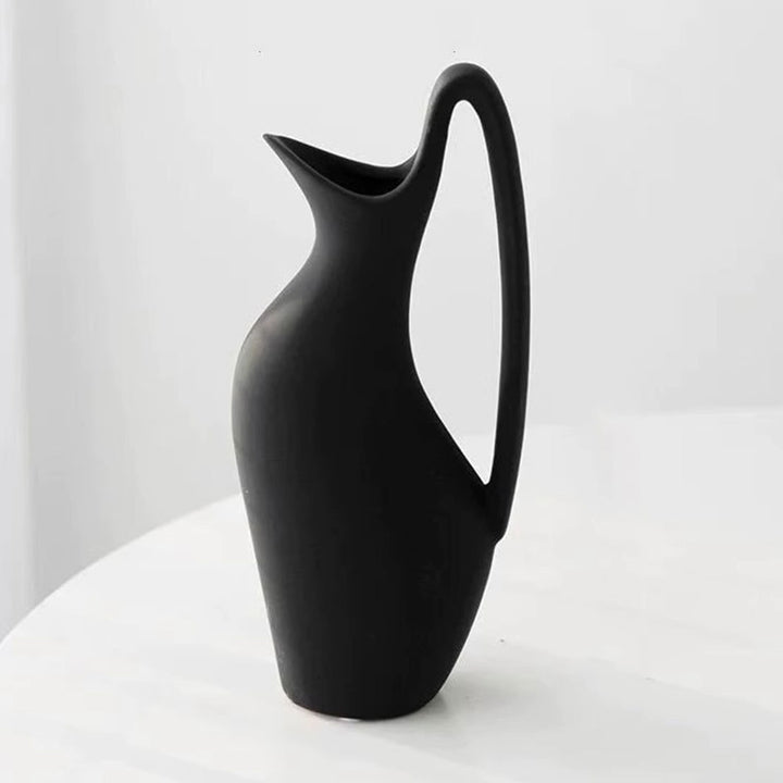 Minimalist Sculptural Ceramic Pitcher Vase with Tall Loop Handle and Narrow Pour Spout