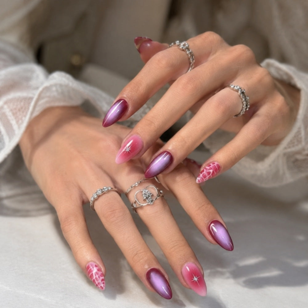 Artificial nails with elegant ombre design and creative accents Stornfield