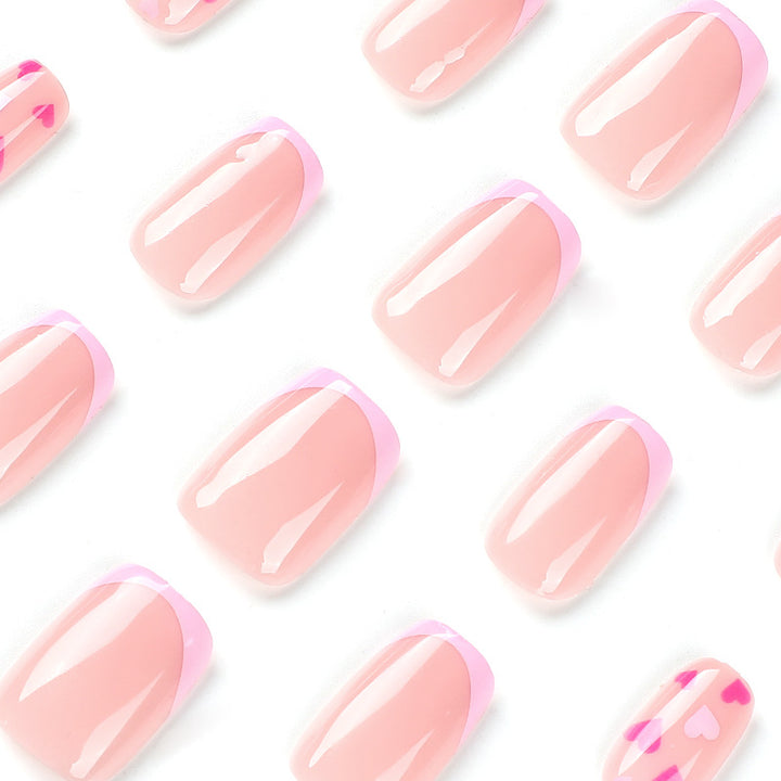 Elegant Nail Art with Heart Motifs Stornfield