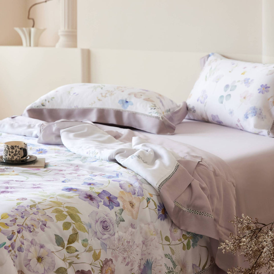 Elegant satin bedding set with floral watercolor print and ruffled bed skirt
