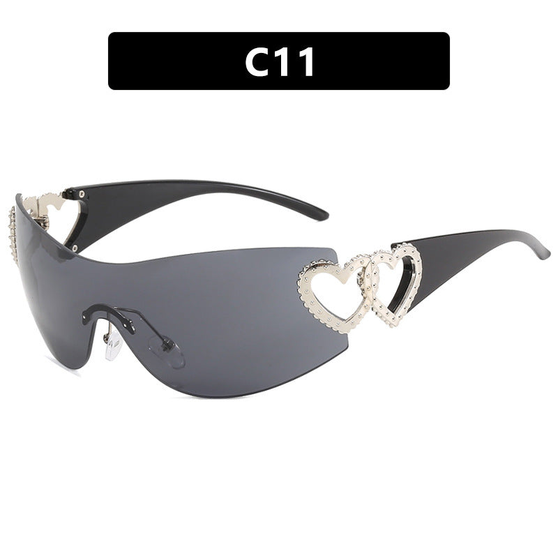 Ladies sporty sunglasses in trendy shield design with heart accents Stornfield