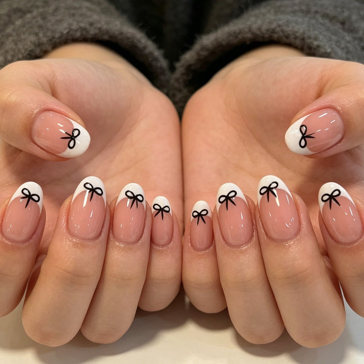 Artistic Bow-Embellished Nail Art Stornfield