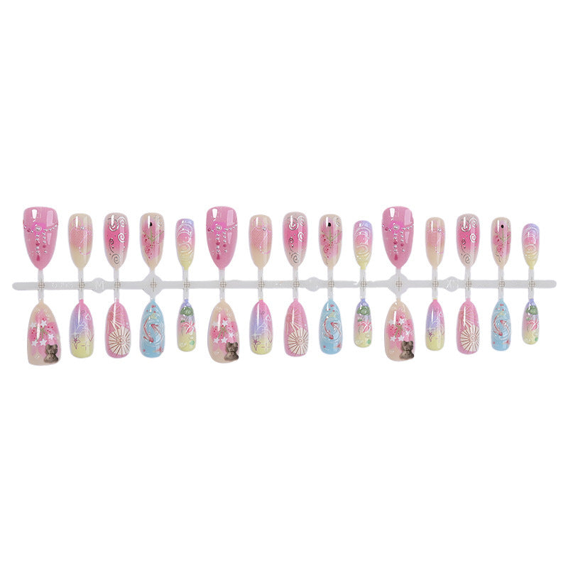 Creative nail art set with floral and playful designs Stornfield