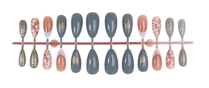 Nail art set with elegant gold accents and creative design Stornfield