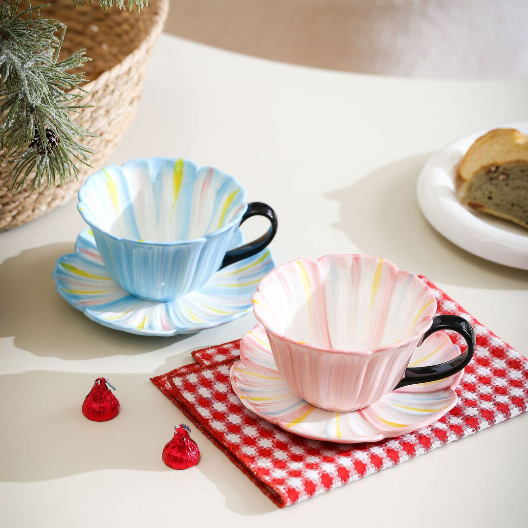 Handcrafted ceramic mug with shell-shaped wave edge and contrasting handle