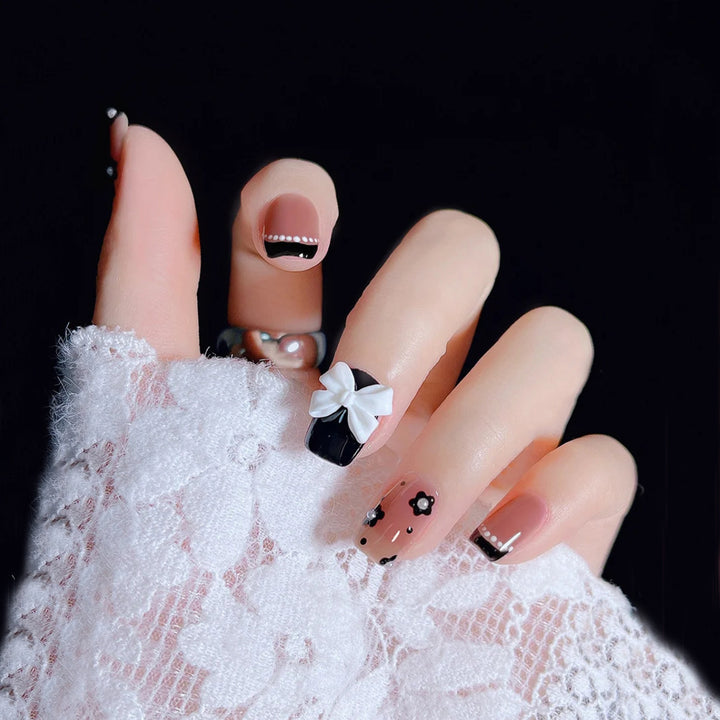 Artificial nail set with elegant bow and flower decoration Stornfield