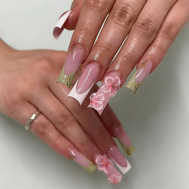Artful nail tips with floral embellishments Stornfield