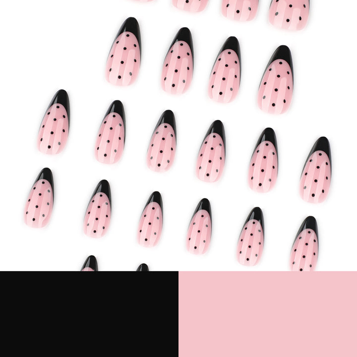 Artistic stiletto nails with black dot pattern Stornfield