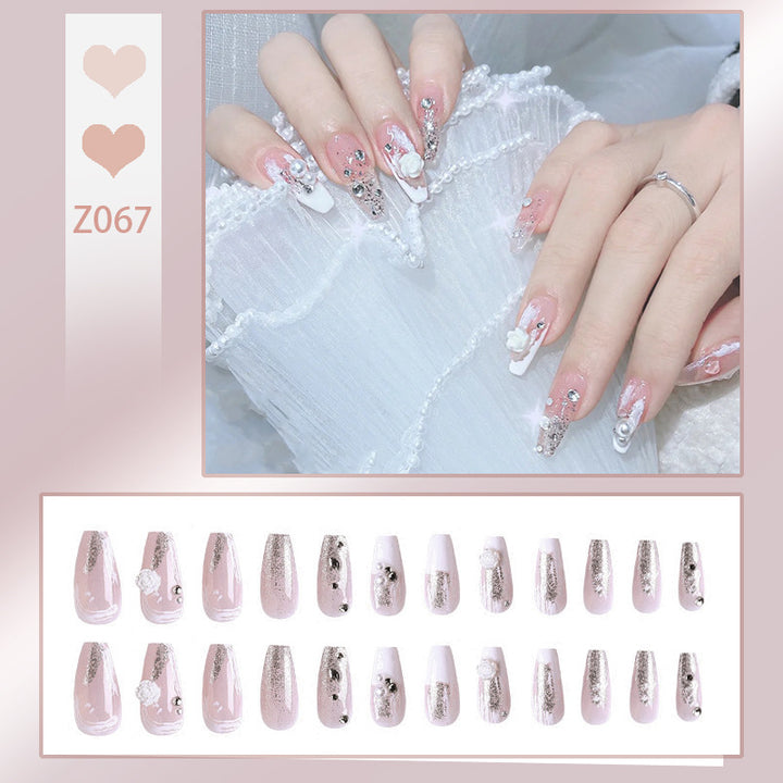 Acrylic nail set with elegant 3D flower and glitter decorations Stornfield