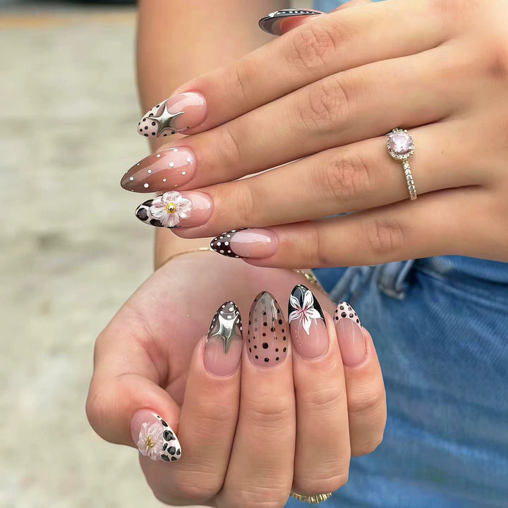 Artistic Press-On Nail Art Set with Unique Floral and Star Designs