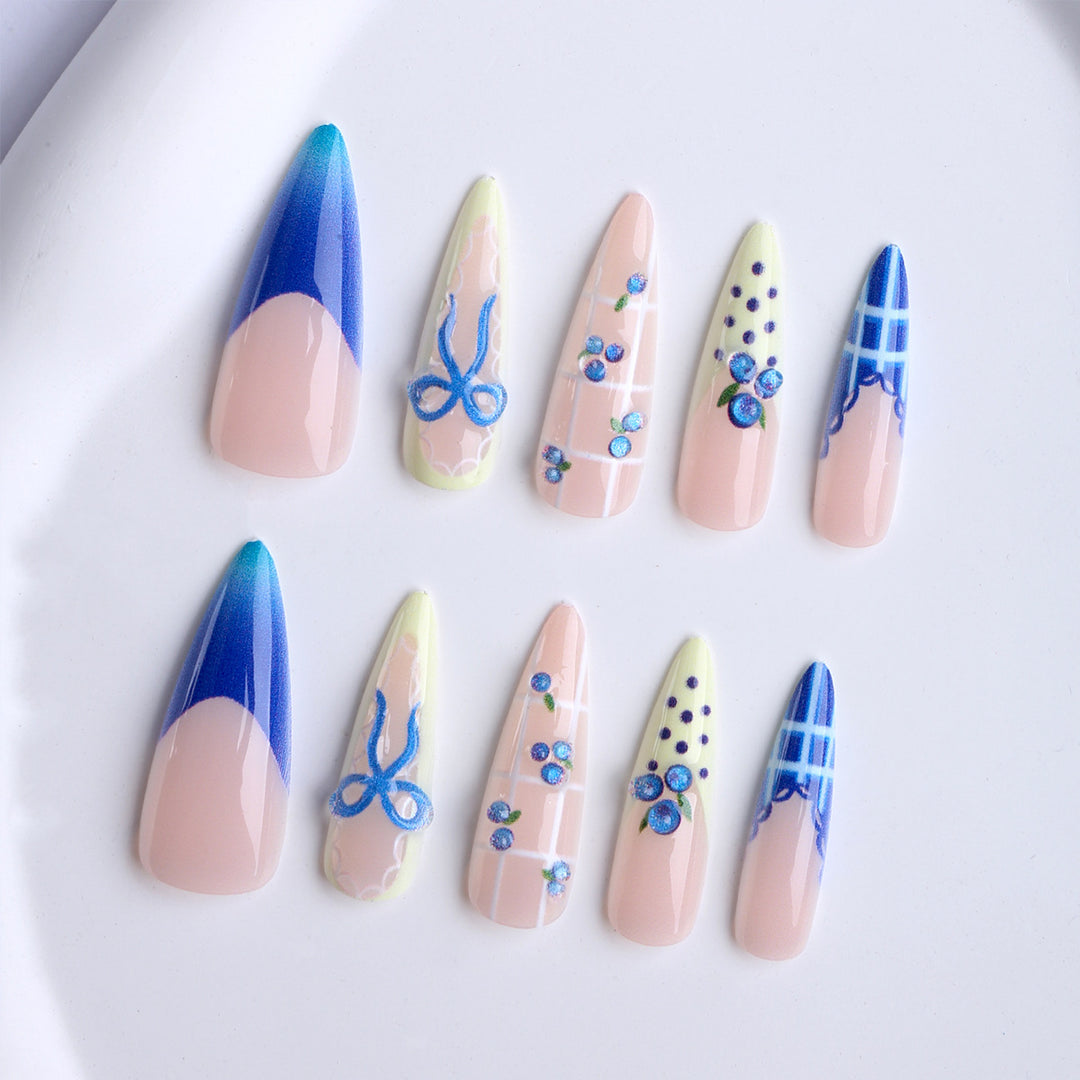 Artificial nails with playful design and elegant accents Stornfield