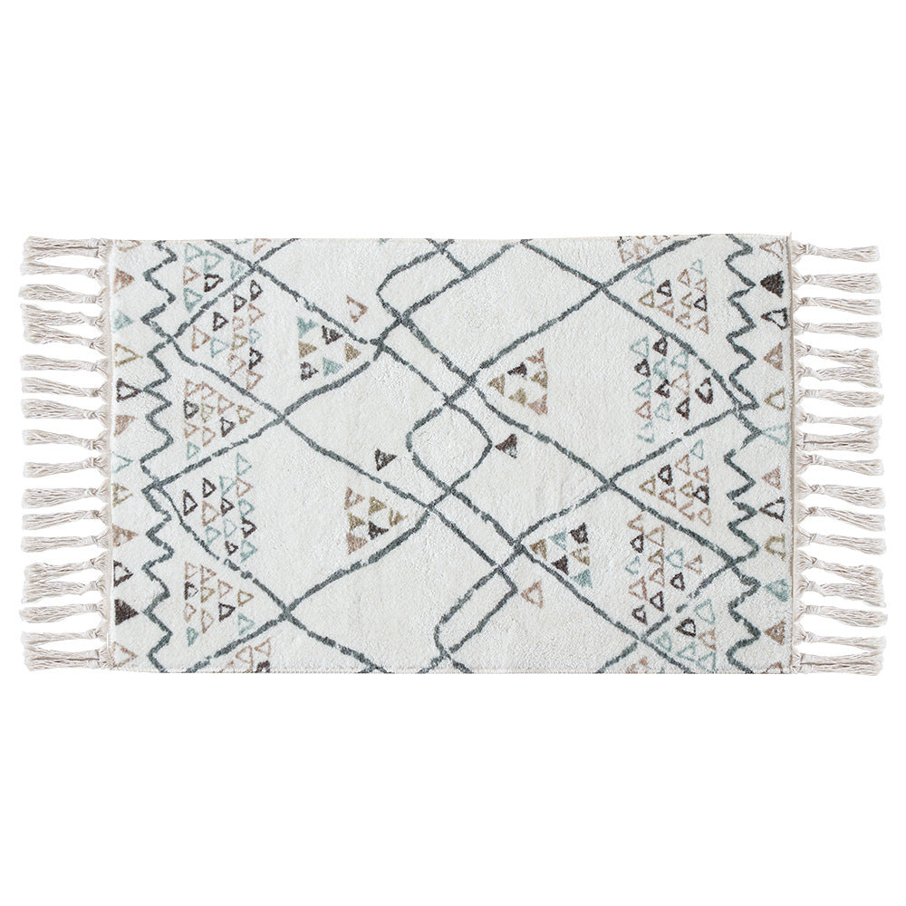 Boho cotton bath mat with fringes and geometric diamond pattern Stornfield