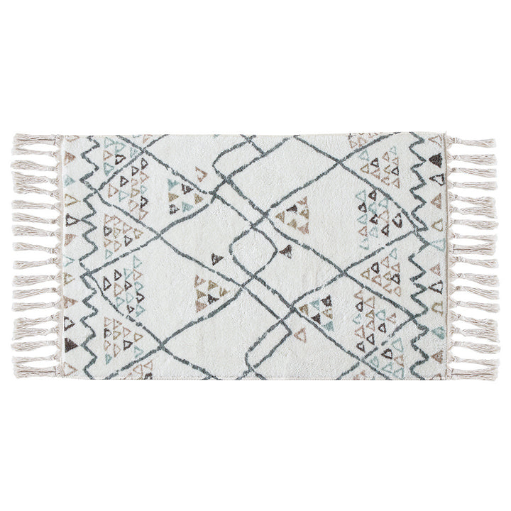 Boho cotton bath mat with fringes and geometric diamond pattern Stornfield