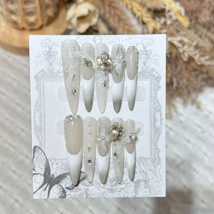 Decorative Stiletto Press-On Nail Art Set with Elegant Lace and Gemstone Accents Stornfield
