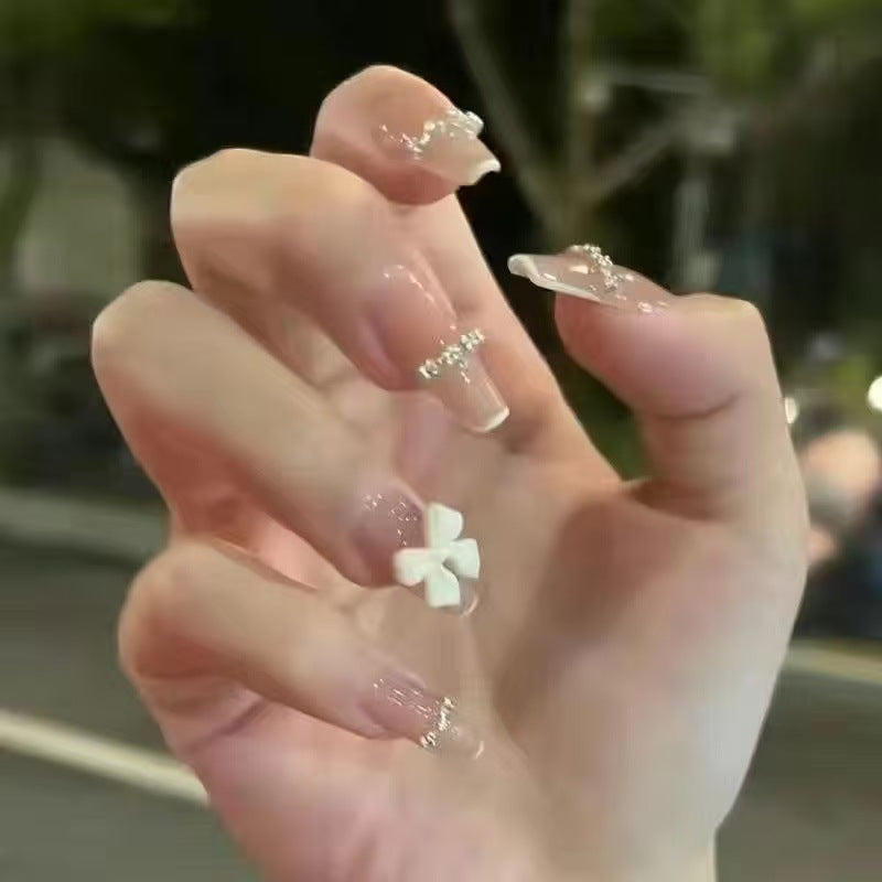 Artificial Nail Set with Glitter and Bow Motif Stornfield