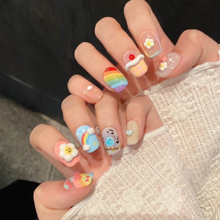 Whimsical Press-On Nail Art Set with Cartoon Designs