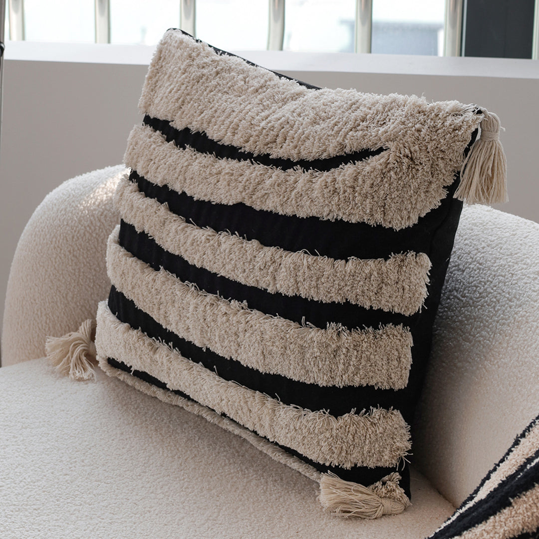 Square decorative cushion cover with hand-tufted ethnic appliqué motif and fringed edge Stornfield