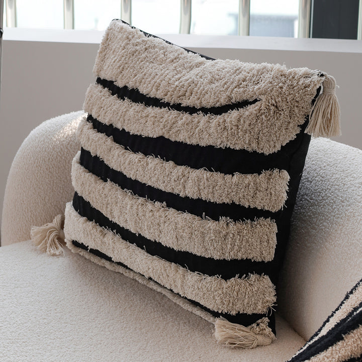 Square decorative cushion cover with hand-tufted ethnic appliqué motif and fringed edge Stornfield