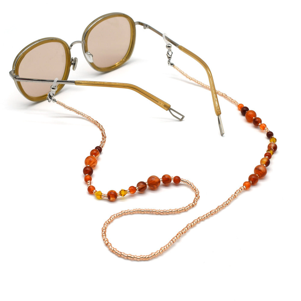 Stylish glasses holder chain with colorful accents Stornfield