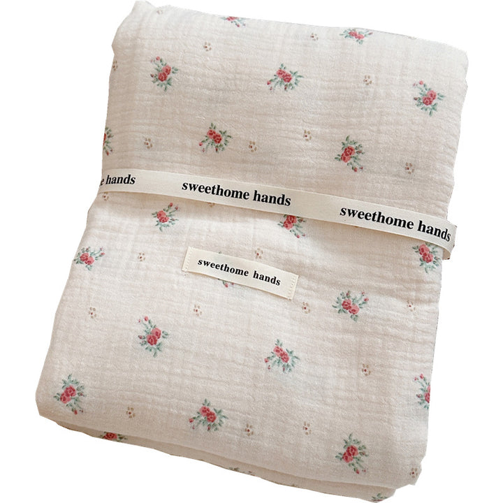 Unisex cuddly muslin blanket with elegant floral pattern Stornfield