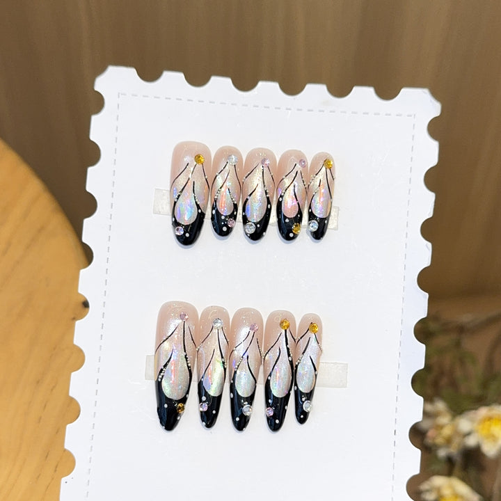 Artifical nail tips with elegant designs and glitter accents Stornfield