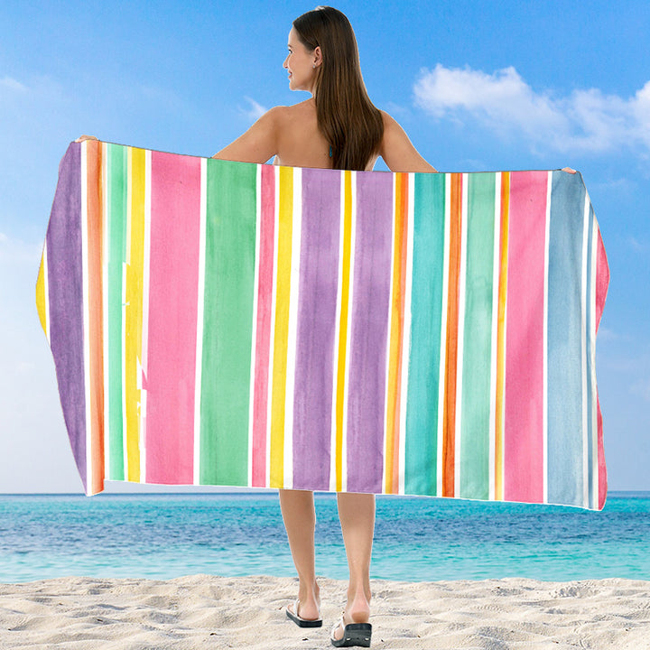 Beach towel with vibrant gradient color and stylish striped design Stornfield