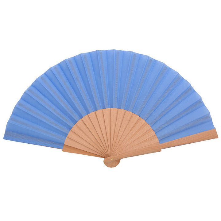 Ladies folding hand fan made of airy material with intricate folds Stornfield