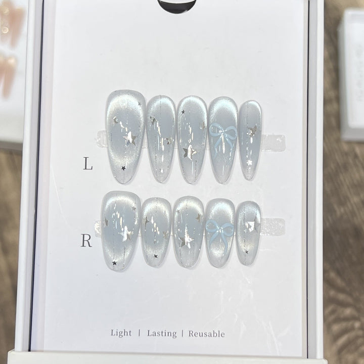 Decorative Stiletto Press-On Nail Set with Star and Bow Accents Stornfield